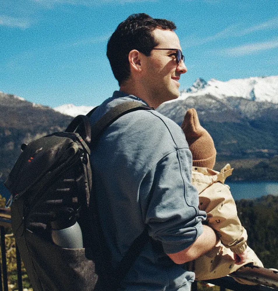 Person (Eldar Gezalov) with backpack on hill